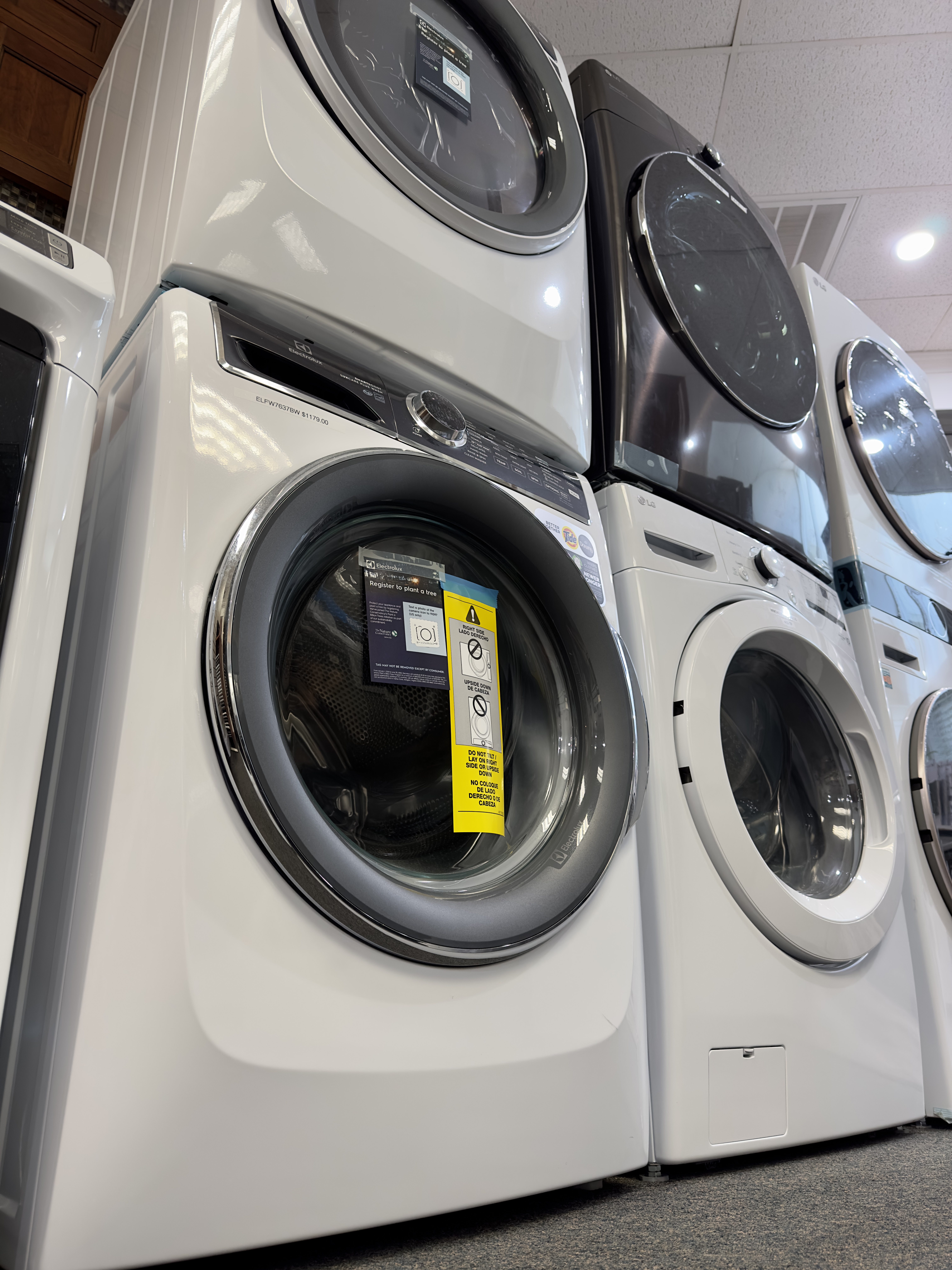 Front-load washers and dryers on display